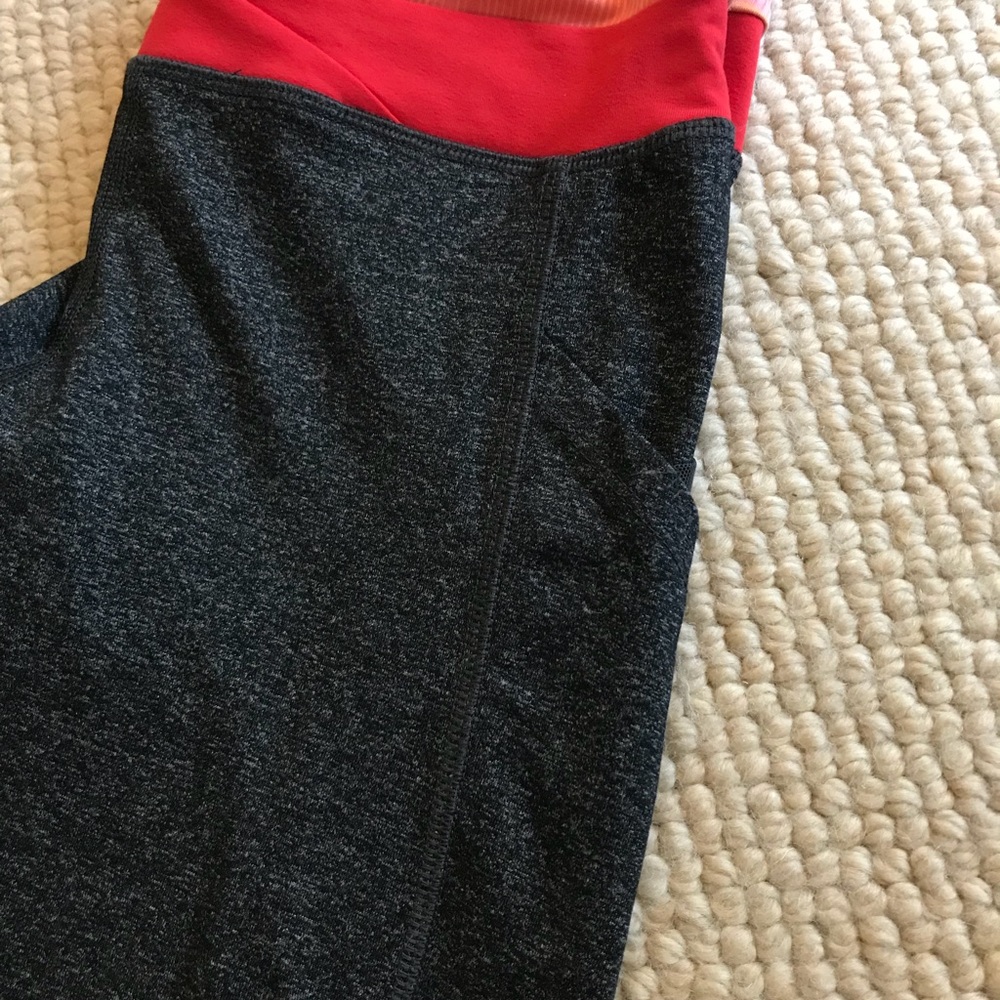 Gray leggings, orange and pink waistband